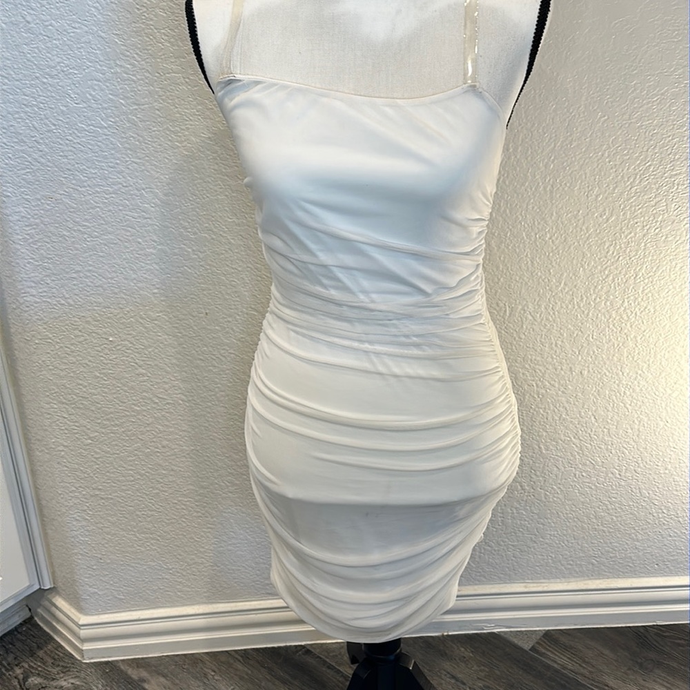 White cinched body con dress